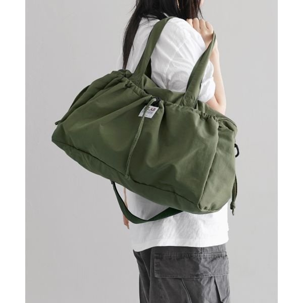 보스 디랩 D.LAB 스트링 포켓 턴 트래블백 khaki 5007630405 3034228